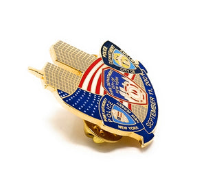 9-11 September 11, 2001 Collectible Commemorative Lapel Pin honoring first responders on that day. Image of the Twin Towers in the center, wrapped color enamel American flag with detailed badges for the New York, New Jersey Port Authority Police, the City of New York Fire Department, and the City of New York Police Department, with September 11, 2001 along the bottom with a blue banner.